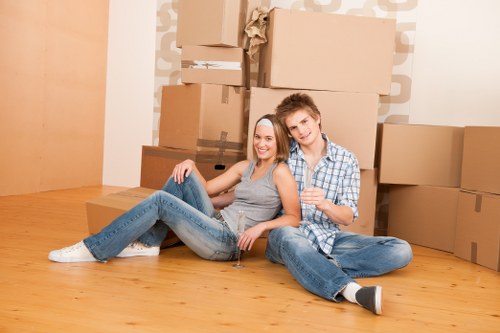 Professional flat removals planning in Shepherdsbush with moving boxes and apartment access