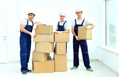 Local moving team handling furniture during a Shepherdsbush relocation