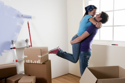 Man and van team loading furniture for a UK removal service