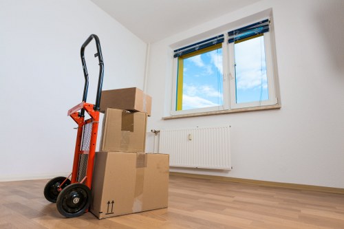 Professional movers handling furniture for a same day relocation